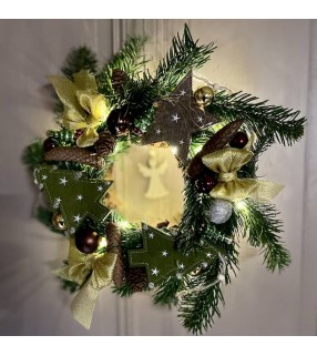 Couronne de Noël artisanale réalisée avec végétaux naturels. AnyFleurs.fr